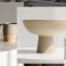 t Minimal product display with cups, bowls, and citrus